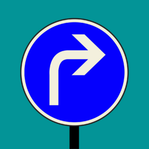 Panneau bleu avec flèche pointant vers la droite